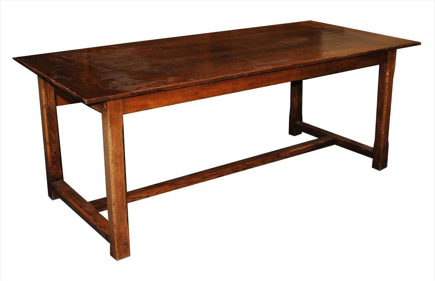 Lot 770 - A reproduction rustic oak refectory table