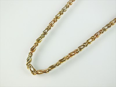 Lot 78 - A tri-coloured curb link necklace