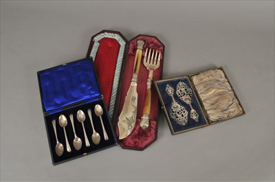 Lot 28 - A cased set of six silver coffee spoons
