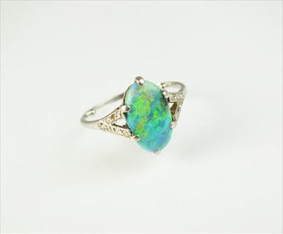 Lot 88 - An Art Deco opal and diamond ring