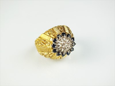 Lot 98 - A 9ct gold sapphire and diamond ring