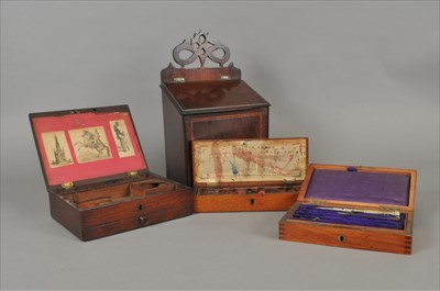Lot 446 - A 19th century mahogany candle box, two watercolour paint boxes and a cased drawing set