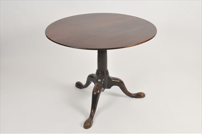 Lot 577 - A 19th century mahogany tilt-top tripod table