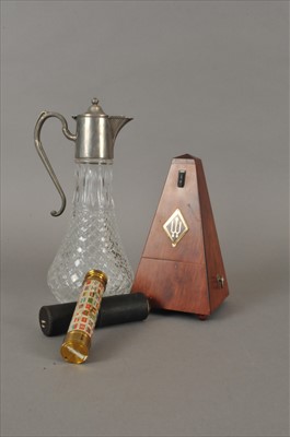 Lot 442 - A metronome, telescope and claret jug.