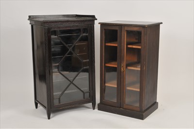 Lot 600 - Two glazed-fronted music cabinets