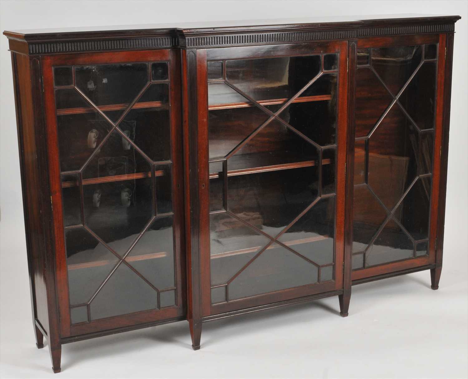 Lot 626 - An Edwardian astragal glazed display cabinet