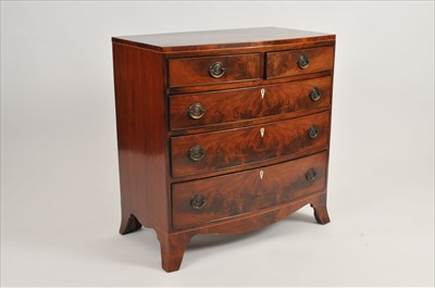 Lot 640 - A small early 19th century century mahogany chest of two short and three long drawers