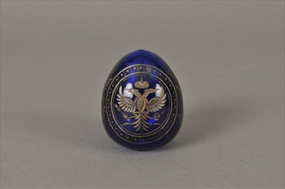 Lot 204 - Fabergé blue cut glass egg