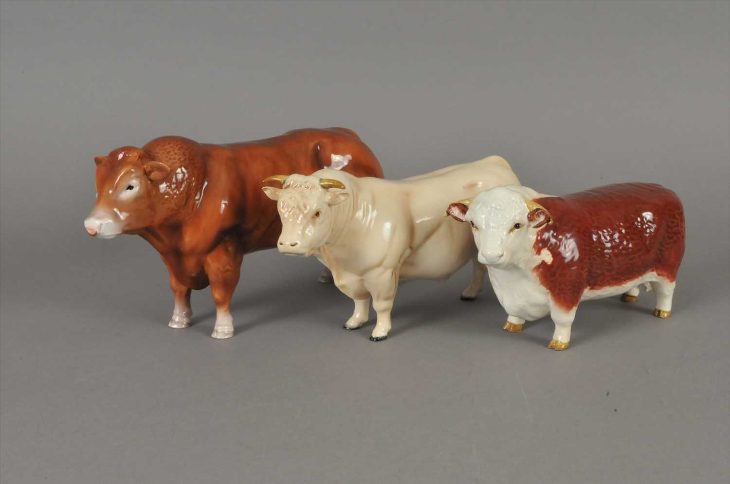 Lot 211 - Three Beswick bulls