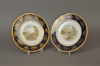 Lot 207 - A pair of Coalport landscape dessert plates