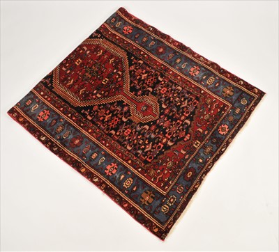 Lot 662 - A Persian style wool rug