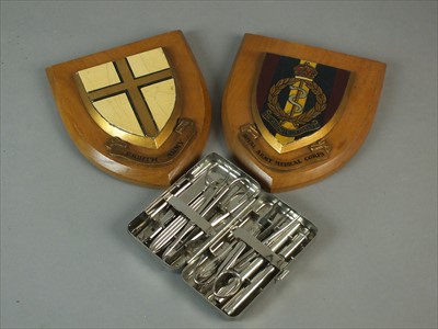 Lot 595 - Eighth Army and Royal Medical Corps shields, German Field Surgeons kit
