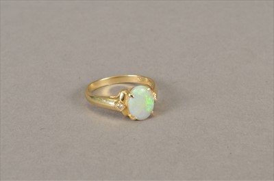 Lot 130 - An opal and diamond ring