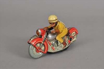 Lot 259 - A Schuco wind-up tin-plate motorbike