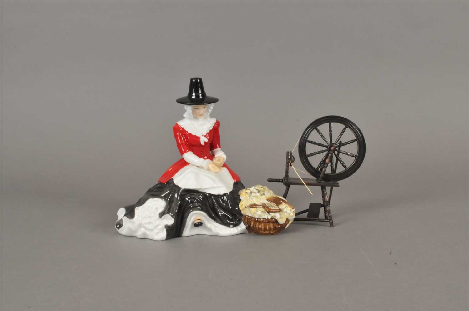 Lot 215 - Royal Doulton Welsh Lady figure - 'Wrth E Droell'