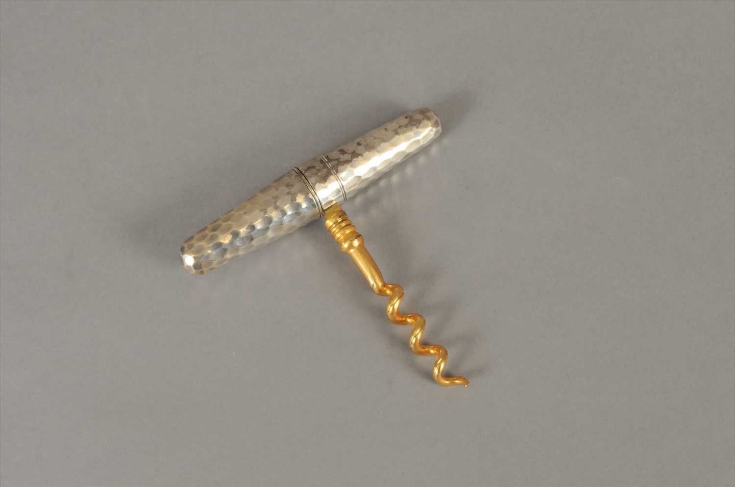 Lot 58 - A silver mounted folding travel cork screw