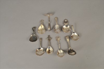 Lot 67 - A collection of eight silver caddy spoons