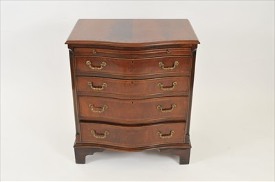 Lot 339 - A good quality reproduction cross-banded mahogany serpentine chest of drawers