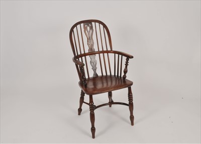 Lot 644 - A 19th century kitchen Windsor chair