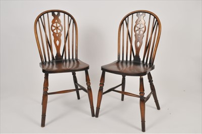 Lot 645 - Two wheelback kitchen chairs