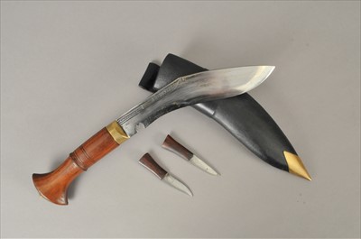 Lot 283 - Three reproduction commando knives, a kukri and a Middle Eastern dagger