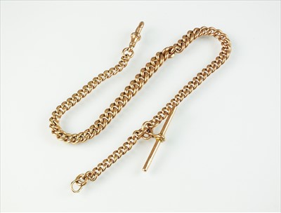 Lot 116 - A 9ct rose gold curb link Albert