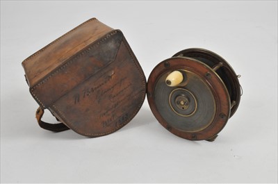 Lot 272 - A late 19th / early 20th century mahogany and brass fishing rod reel