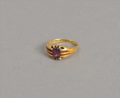 Lot 74 - An 18ct gold almandine garnet ring