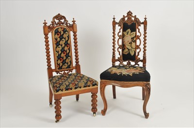 Lot 332 - Two Victorian walnut high-backed hall chairs