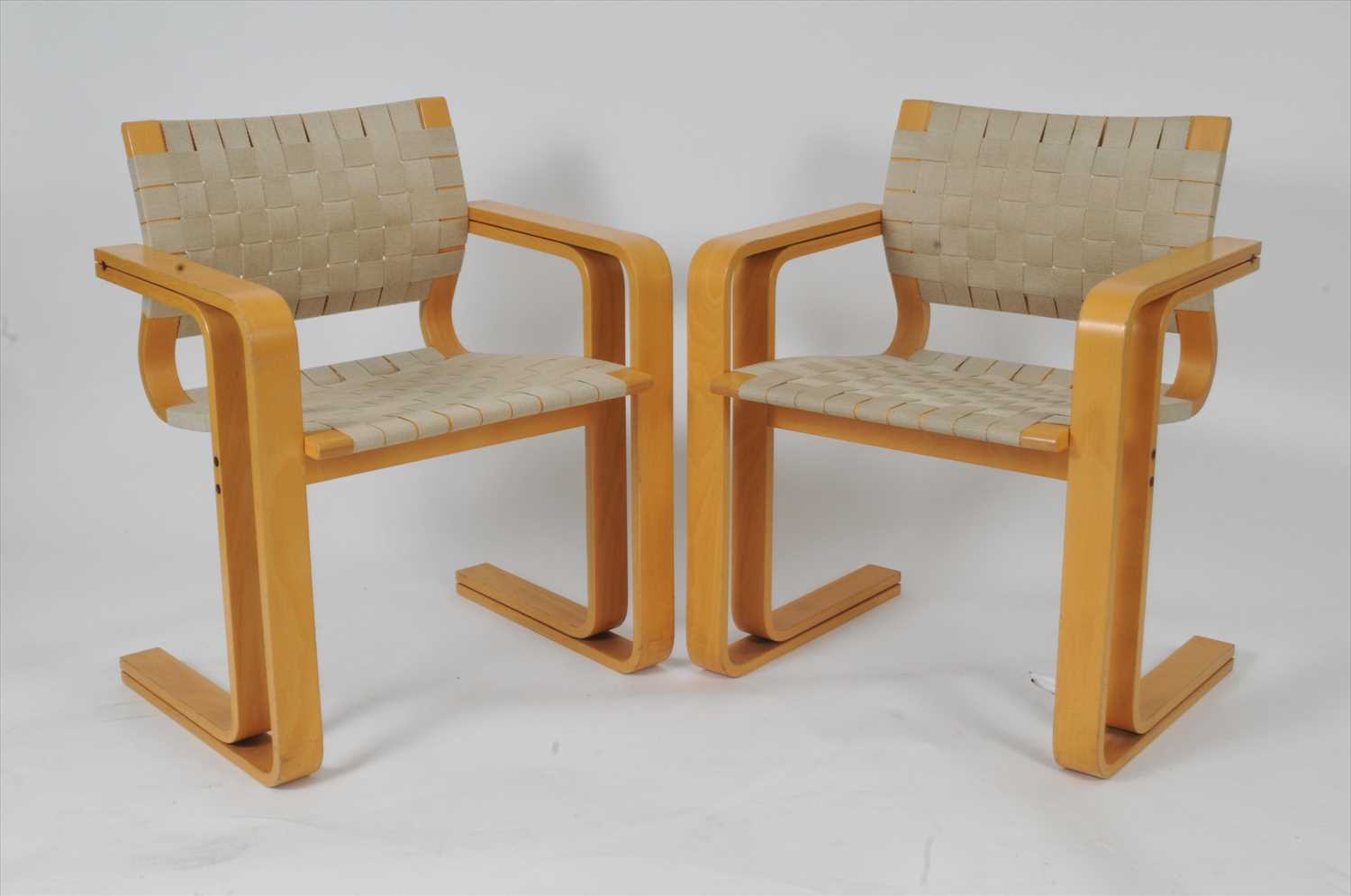 Lot 578 - A pair of Danish Magnus Olesen 8000 Series armchairs