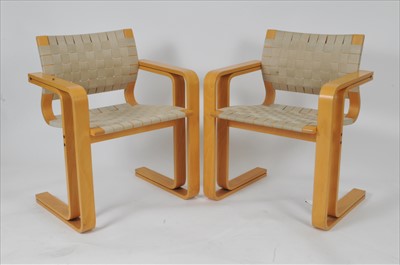 Lot 578 - A pair of Danish Magnus Olesen 8000 Series armchairs