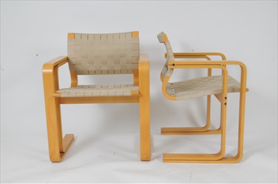 Lot 578 - A pair of Danish Magnus Olesen 8000 Series armchairs