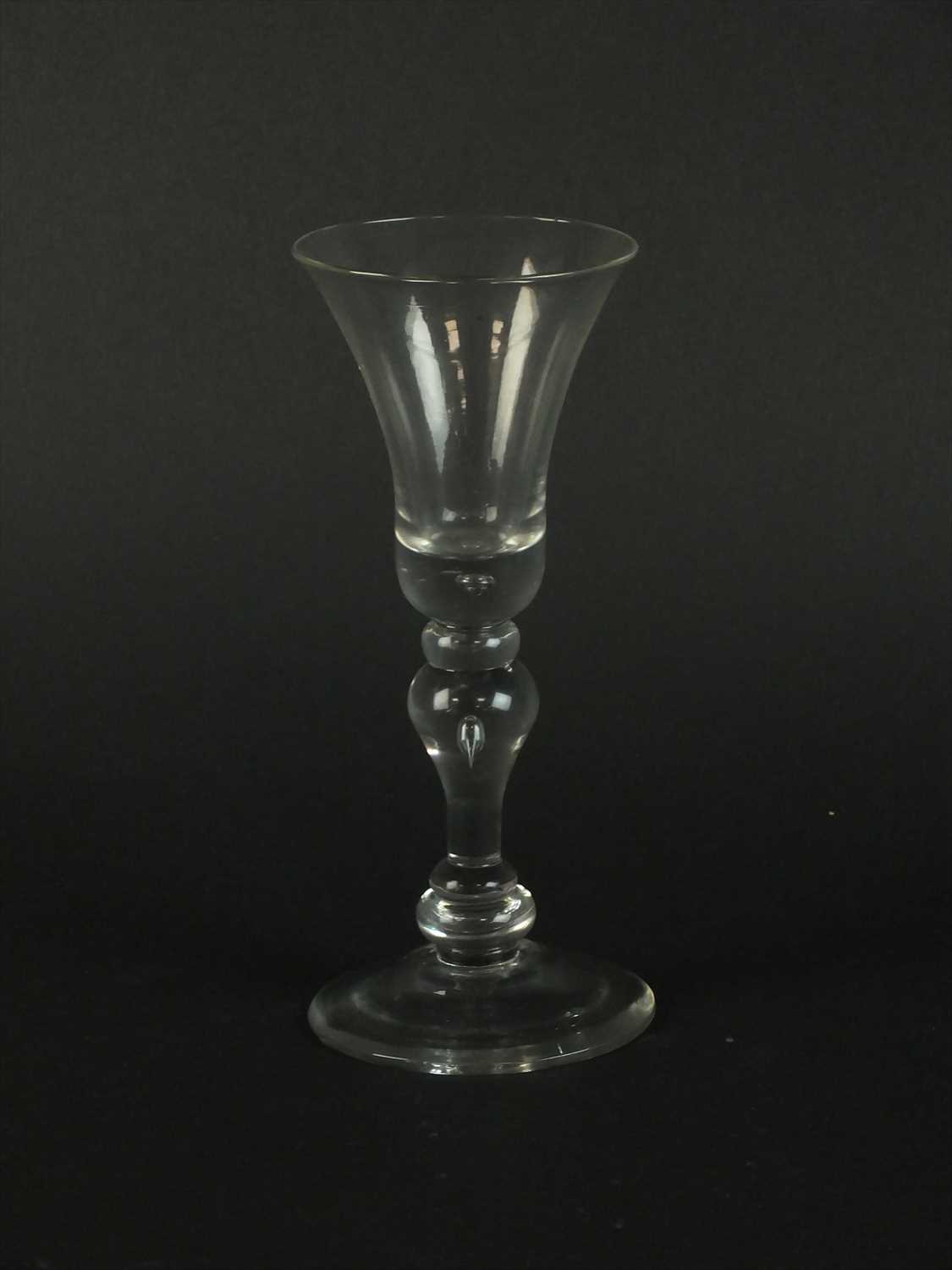 Lot 585 - Mid-18th century baluster wine glass
