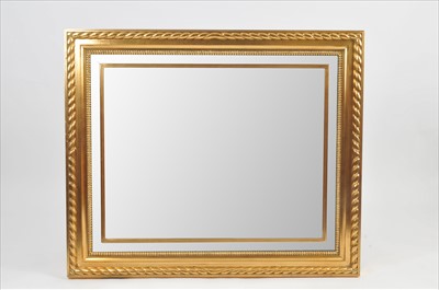Lot 384 - A contemporary gilt framed wall mirror