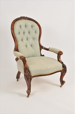 Lot 322 - A Victorian mahogany framed upholstered spoon back armchair