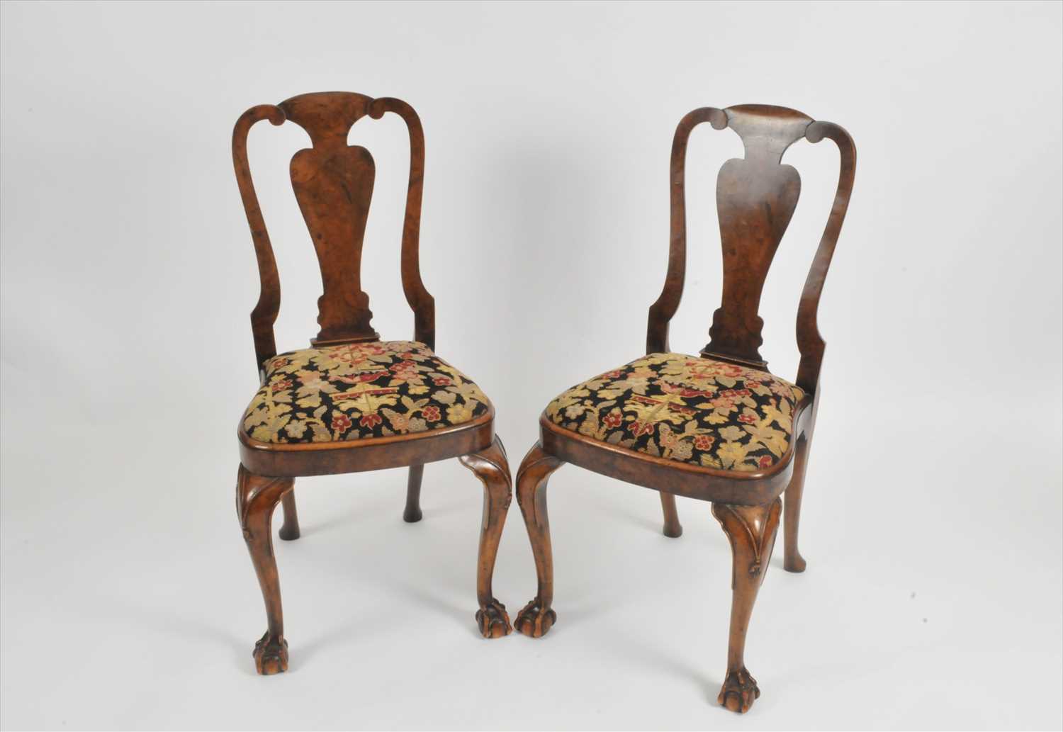 Lot 309 - A pair of Queen Ann style walnut side chairs