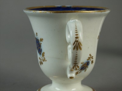 Lot 317 - Two Caughley and French egg cups