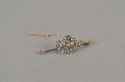 Lot 85 - A rose cut diamond set bar brooch