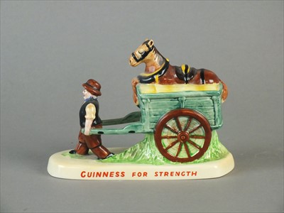 Lot 521 - Carlton Ware Guinness advertising group - 'Guinness for Strength'