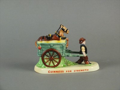 Lot 521 - Carlton Ware Guinness advertising group - 'Guinness for Strength'