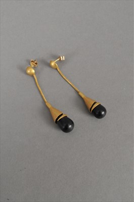 Lot 83 - A pair of black stone drop ear pendants