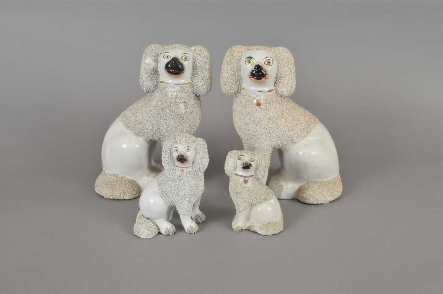Lot 147 - Four Staffordshire poodles