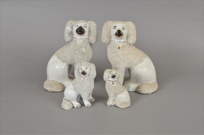 Lot 147 - Four Staffordshire poodles