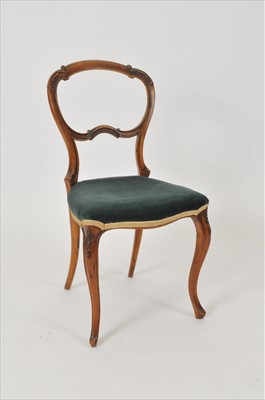 Lot 344 - A 19th century French bedroom chair with a fixed upholstered seat.