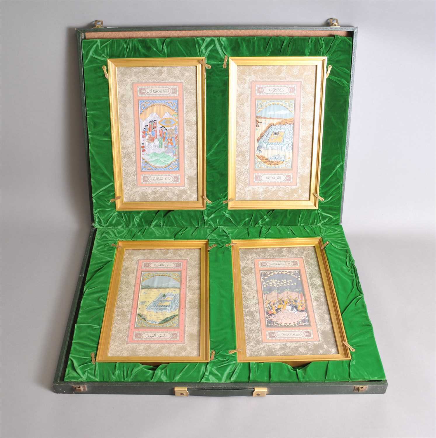 Lot 661 - A cased set of Four Middle Eastern / Islamic silk panels