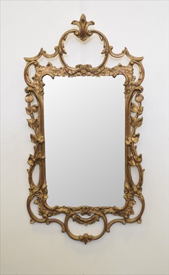 Lot 350 - A reproduction gilt framed wall mirror in the Chippendale manner