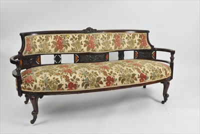 Lot 587 - A Victorian upholstered mahogany framed kidney shaped settee