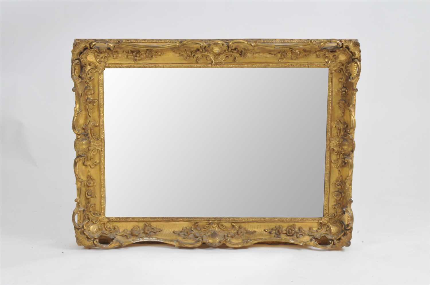 Lot 404 - A large 19th century gilt plaster framed wall mirror