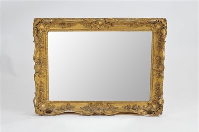Lot 404 - A large 19th century gilt plaster framed wall mirror