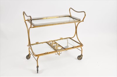 Lot 421 - A 20th century Italian brass framed two-tier cocktail / drinks trolley